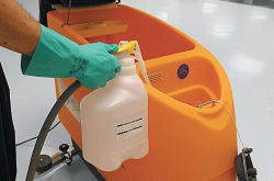 industrial cleaning chemical container and orange bucket