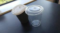 Two cups with lids