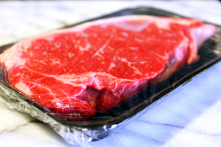 Steak in an open package