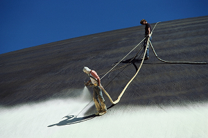Architectural Paint Being Applied to Surface