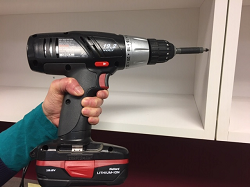Global Electric Power Tools Person using an electric power drill
