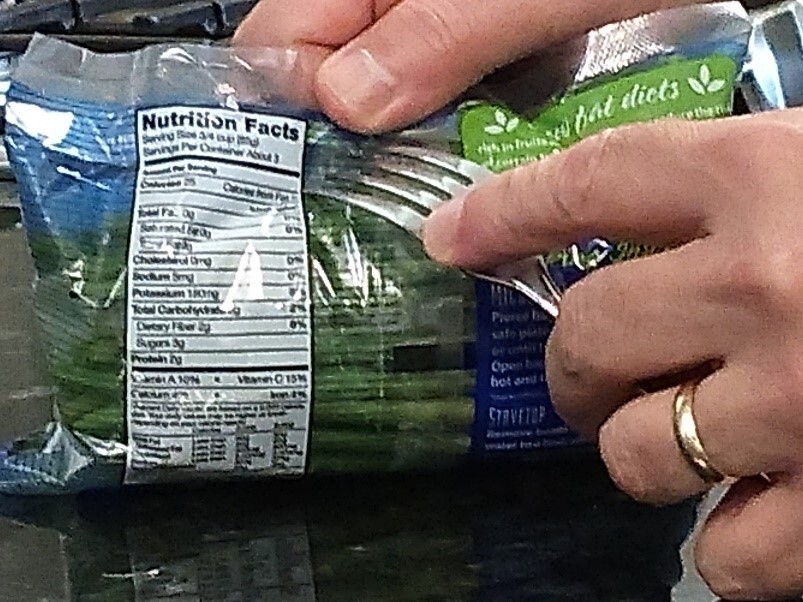 Steamable pouches have made it easier than ever to eat your vegetables. fork and green beans steamable pouch