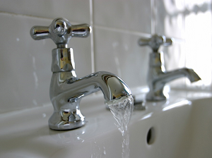 Global Nonresidential Plumbing Two faucets with one running water